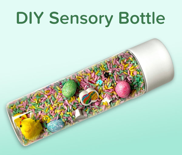 Easter Sensory Bottle with colored rice and themed items - finished product from the DIY Easter Sensory Bottle Kit