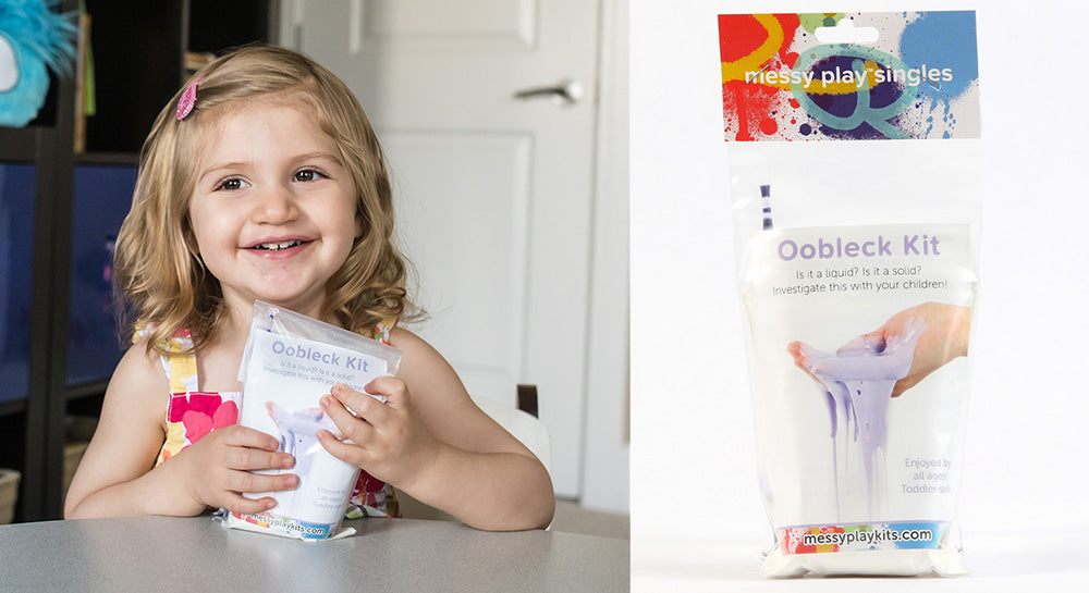 Child holding an Oobleck Kit from Messy Play Kits