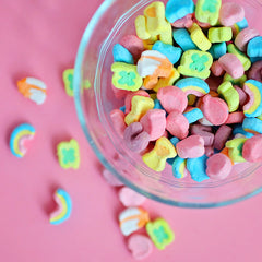 colorful marshmallow dry cereal in a small glass bowl