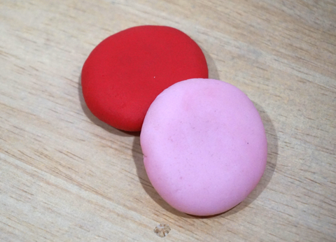 Valentine's Day color-changing squishy dough in red and pink.