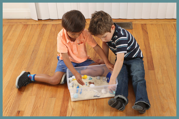 Messy play provides an opportunity for your child to develop social skills with their peers