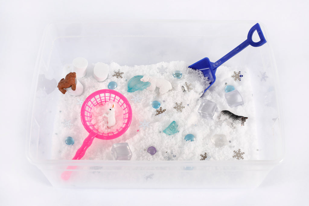 Winter sensory bin with instant snow.