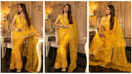 Indian women wearing Yellow organza saree