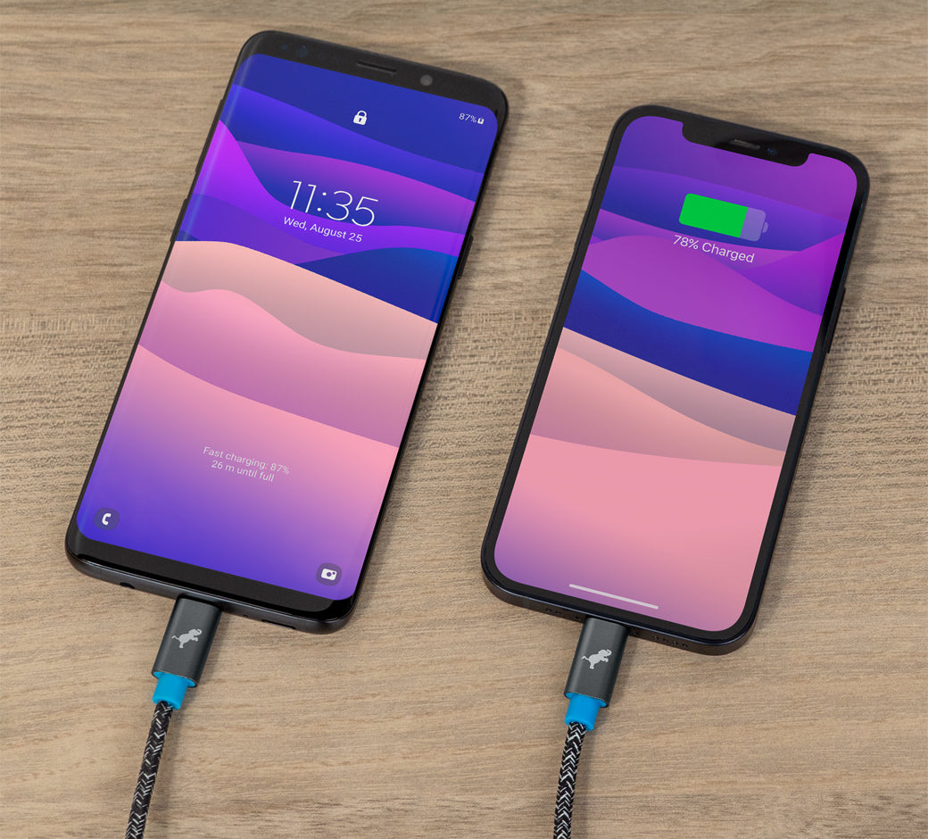 Two smartphones charging with braided USB-C cables, showing fast charging on both devices.