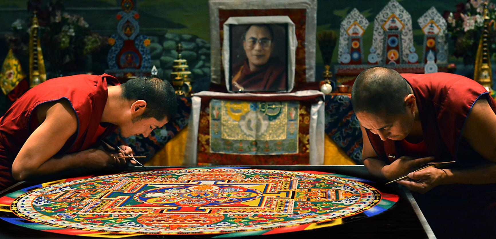 Tibetan Monks drawing a Mandala art