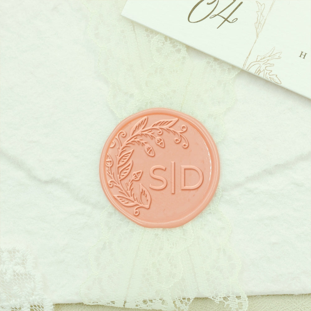 Enhance your wedding invitations with our elegant custom wax stamp. Crafted  with precision, this stamp adds a timeless touch of…