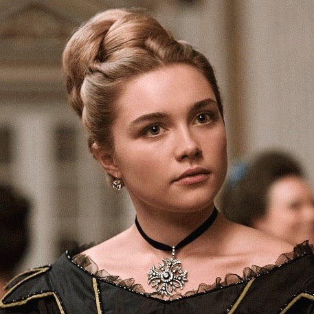 Florence Pugh as Amy March in Little Women wearing a natural makeup look.