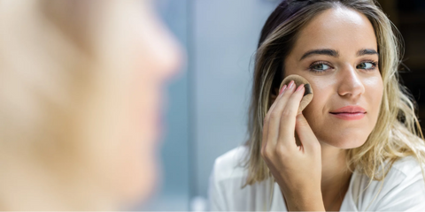 Girl Applying Makeup in Front of Mirror 