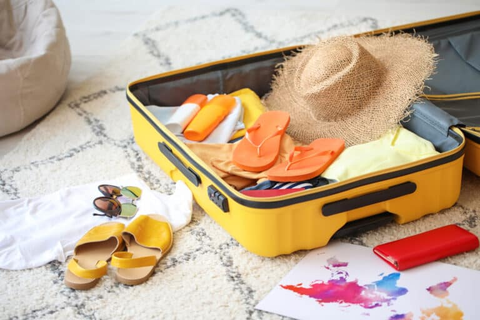 Yellow Luggage and with Yellow Slipper and Summer Hat