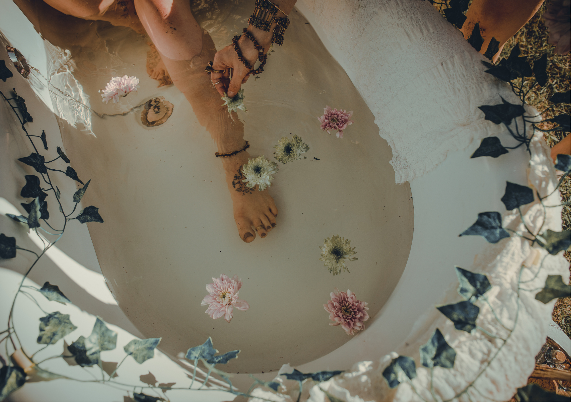 Outdoor bath with flowers and beautiful jewellery 