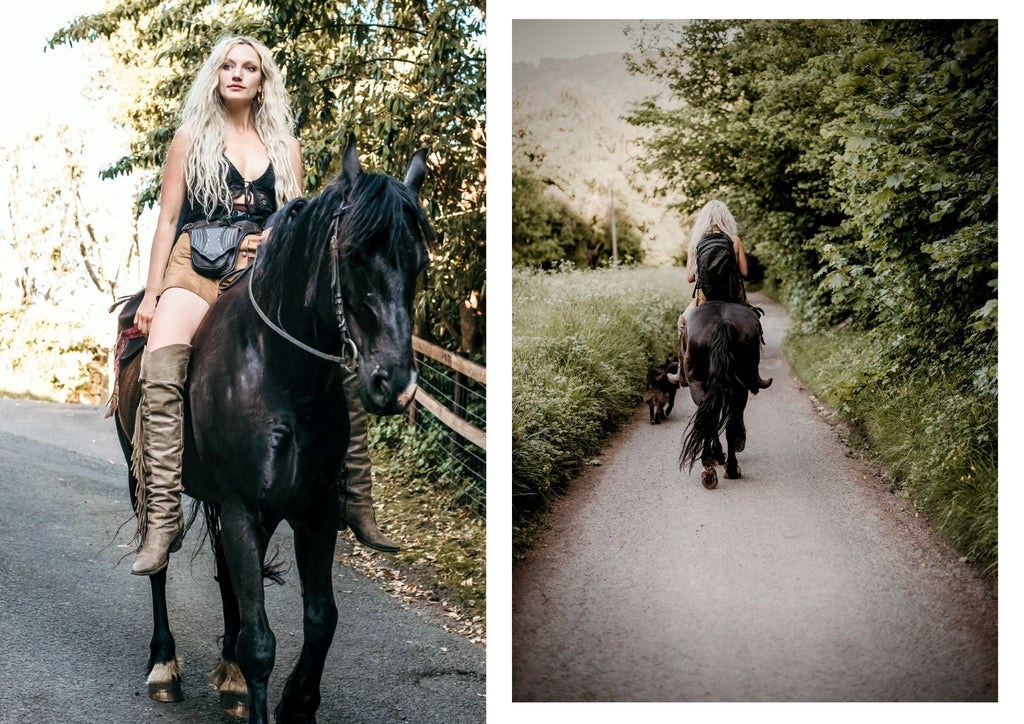On a serene countryside trail, a woman rides her horse, accompanied by her four-legged companion. Her leather riding bag gracefully hangs from her waist, offering a perfect blend of style and functionality. It provides easy access to essentials, making every moment of their horseback adventure seamless and enjoyable. (Keywords: countryside trail, horse ride, four-legged companion, leather riding bag, style and functionality, horseback adventure)