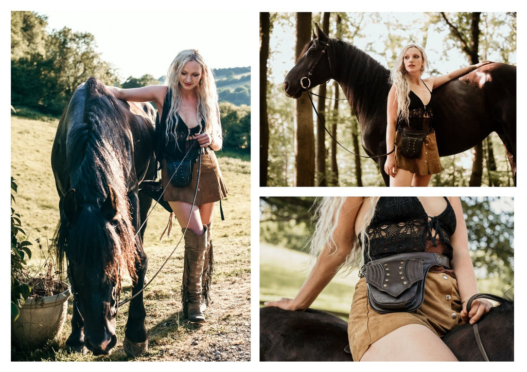 An idyllic scene unfolds as a woman walks with her horse and dog through the enchanting woods. Her leather belt bag adds a touch of urban chic to the rugged adventure, keeping her essentials within reach as she explores nature's wonders. (Keywords: woods, horse, dog, leather belt bag, urban chic, nature's wonders)