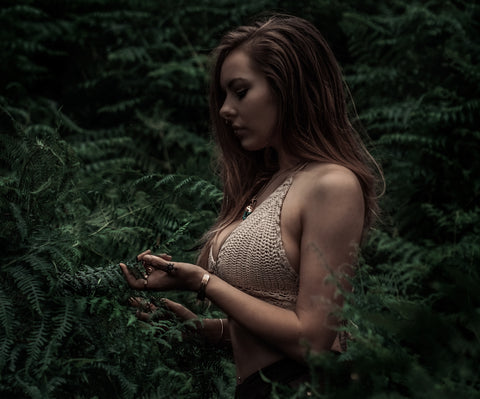 Lux Lucis wearing Forage jewellery in fern forest | powerful women, gemstone jewellery, gifts from independent businesses