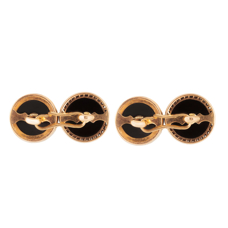 A pair of French Night and Day Onyx Diamond Cufflinks