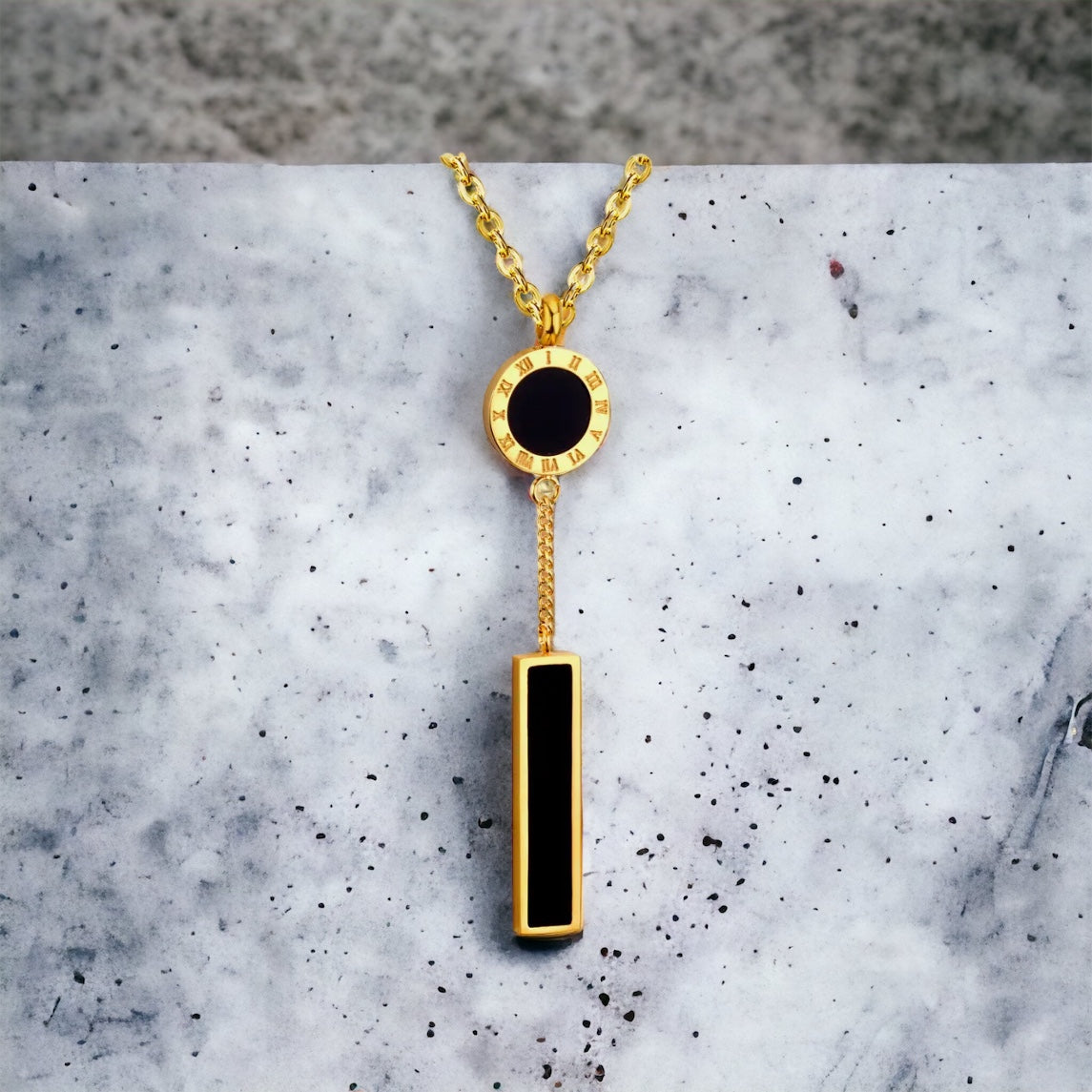 Stainless steel Roman numerals circle & bar necklace. Gold, black.