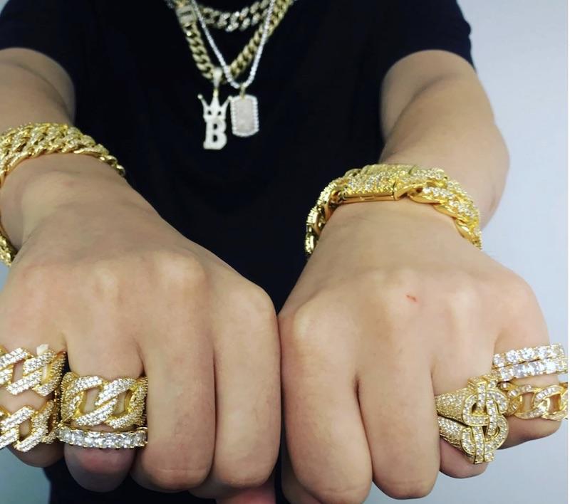 https://cdn.shopify.com/s/files/1/2551/3076/collections/popular-iced-out-rings-147400.jpg