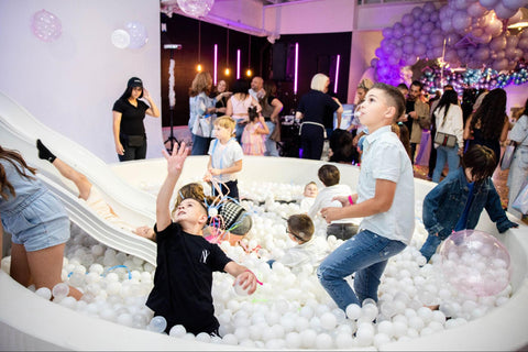 Kids at a ball pit during Boujie Mama Relaunch Party