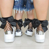 These trendy fish net ankle socks are the perfect addition to any of our causal or classic collections. Depending on the size of your child, these socks can fit our baby diva's (up to calf) or our tween diva's (ankles). Each fish net sock has a big bow on the back.  One size fits all - available in white or black