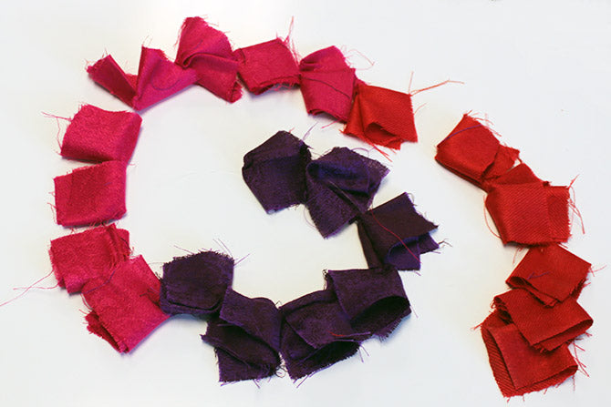 sample strand of the folded scarve squares for the Ombre Scarf Chandelier