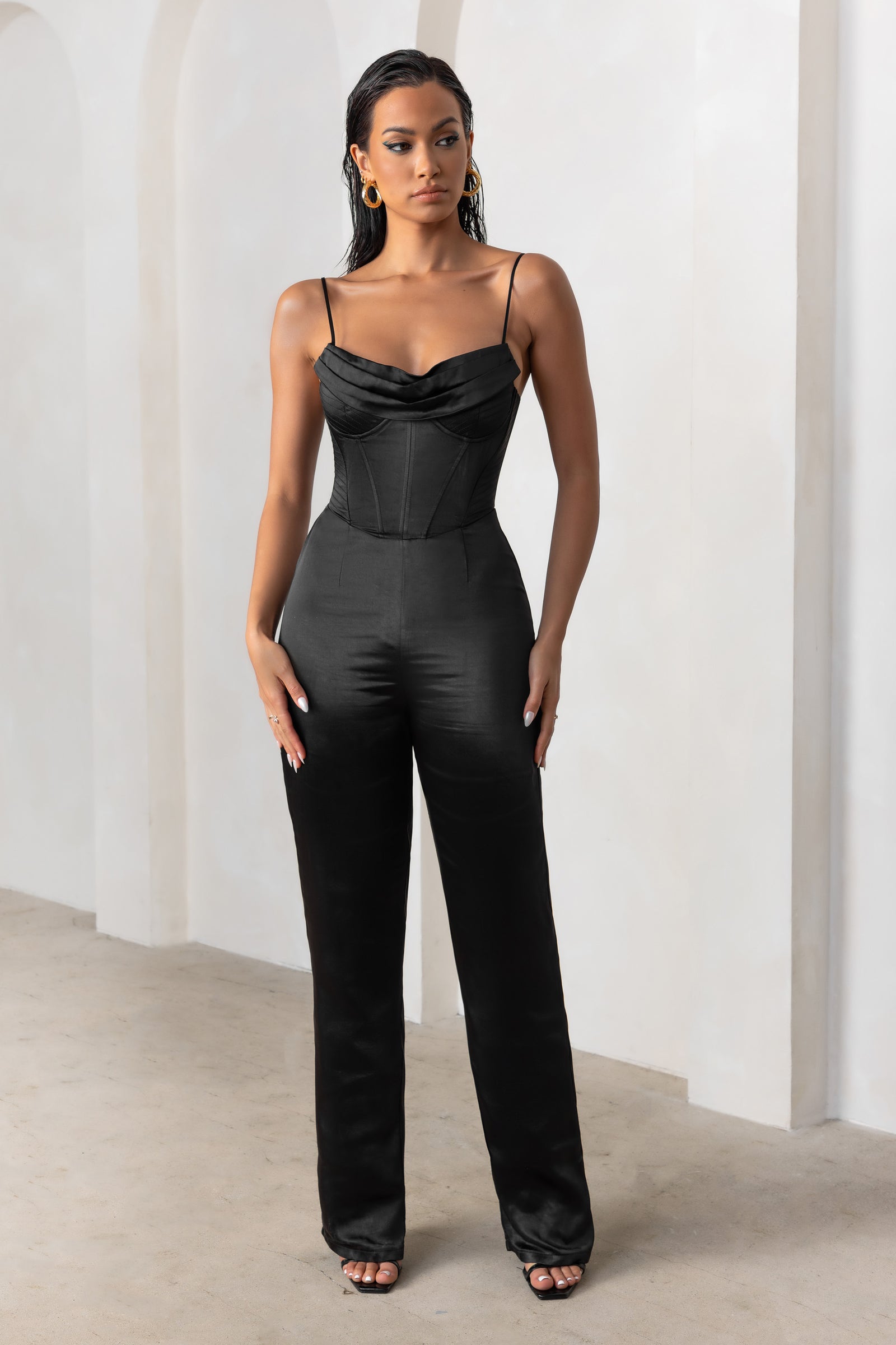 https://cdn.shopify.com/s/files/1/2552/7548/products/CL127454-ReservedDestinationBlackSatinSquareNeckCorsetWideLegJumpsuit0_x2400.jpg