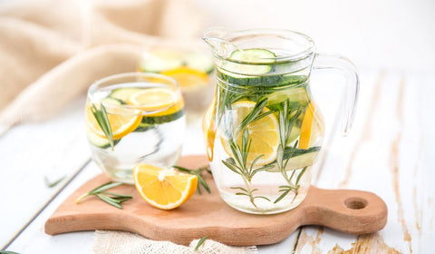 mint and lemon inside glass of water