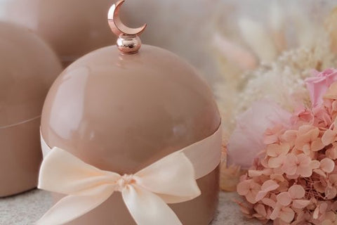 RASM Moon Dome Jar in Terracotta Rose with Rose Gold Crescent Moon, tied with a ribbon, prepped for gifting