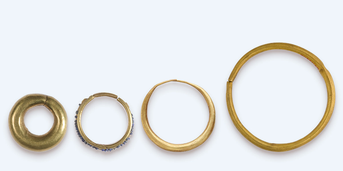 Four ancient Egyptian hoop earrings from ca 1600 BCE