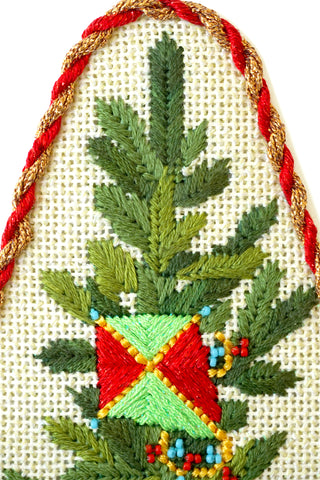 Top of stitched Merry Wishes Tree needlepoint canvas