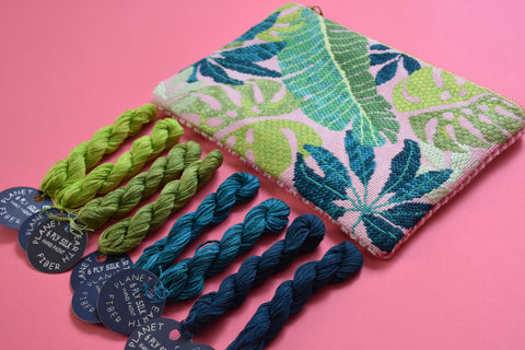 Finished Palm Leaf needlepoint clutch with threads