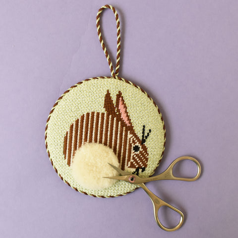 Bunny needlepoint ornament with curved scissors