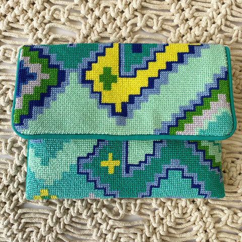 Finished geometric needlepoint clutch