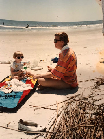 Young Tess with mom Elizabeth on the beach