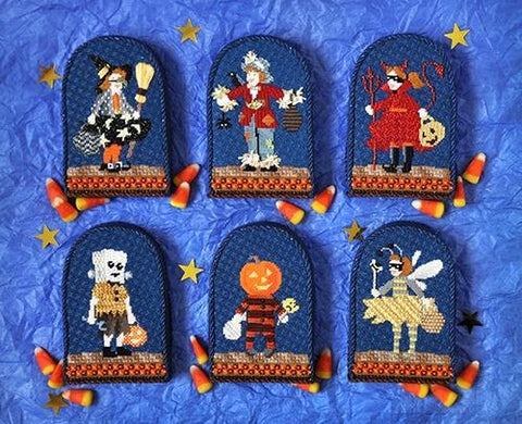 Finished trick-or-treater needlepoint stand-ups