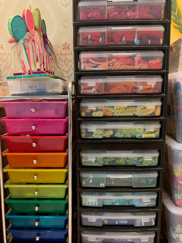 Needlepoint thread organized in drawers