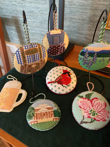 Various finished Blue Ridge Stitchery needlepoint ornaments