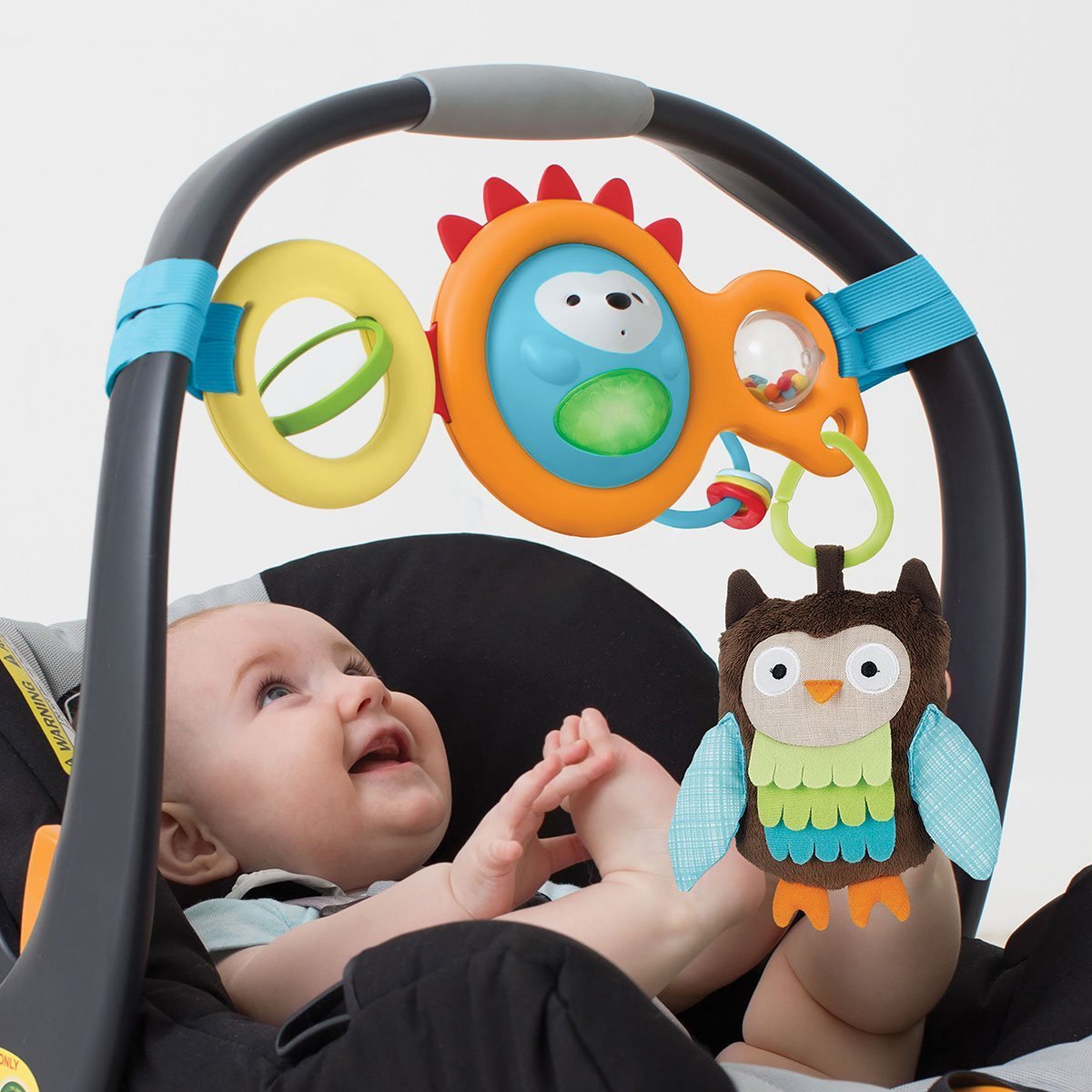 skip hop explore and more rolling owl push toy