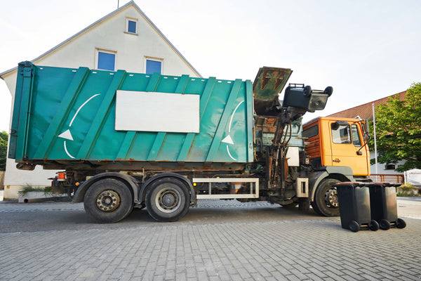 garbage disposal truck to dispose old mattress