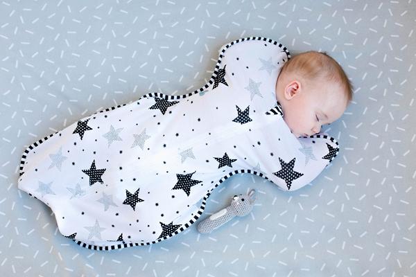 A sleeping bag, blanket and swaddle 