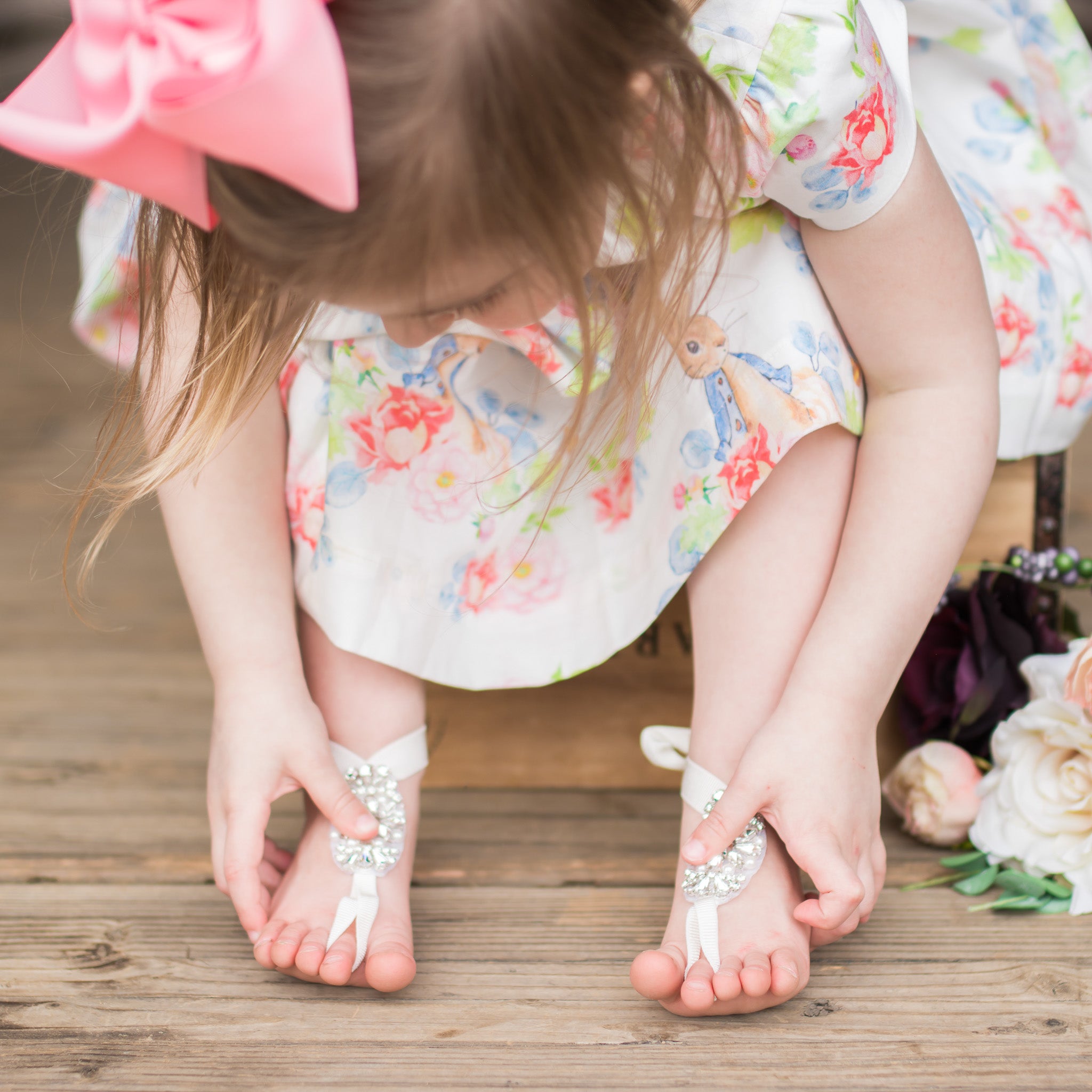little girl barefoot sandals