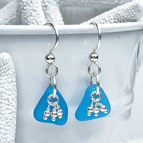 Eye-Catching Turquoise Sea Glass Earrings with Sterling Silver Beads