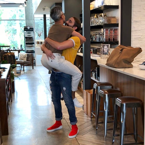 Tan France jumped into JVN's arms as soon he walked into ULAH