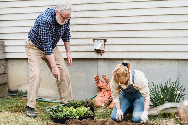 old couple gardening