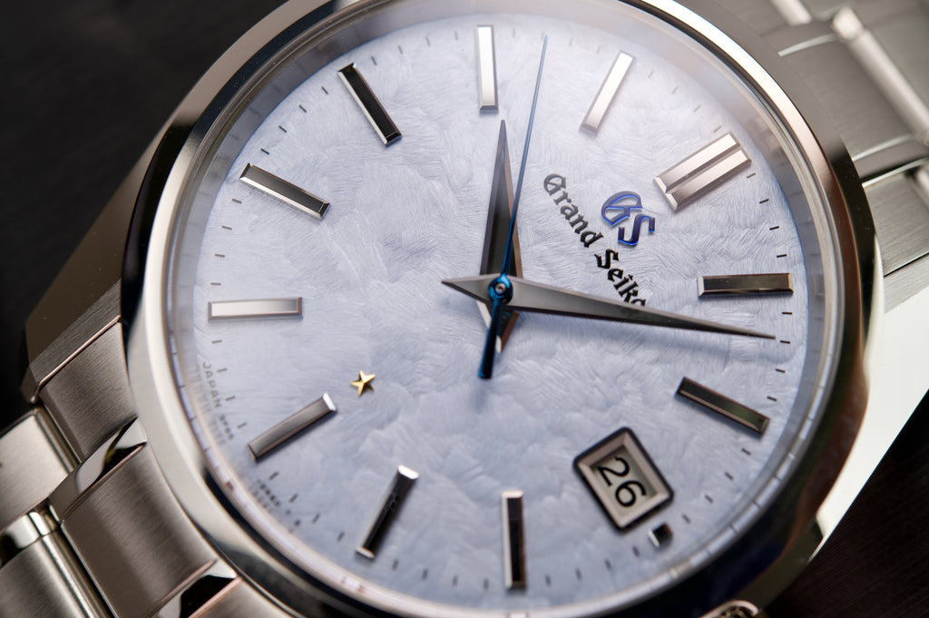 "Grand Seiko SBGP017: Limited Edition Quartz Watch with Sky Blue Dial" WatchOutz.com