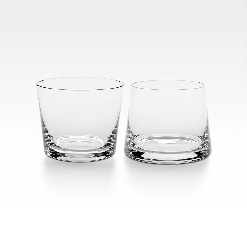 Avva Small Tumblers (Set of 2). ST1 and ST2 tumblers are mouth-blown from non-lead crystal and are dishwasher safe. The perfect complementary angles of the tumblers attest to the skill of their makers and may also help remind you which is yours as the night wears on.