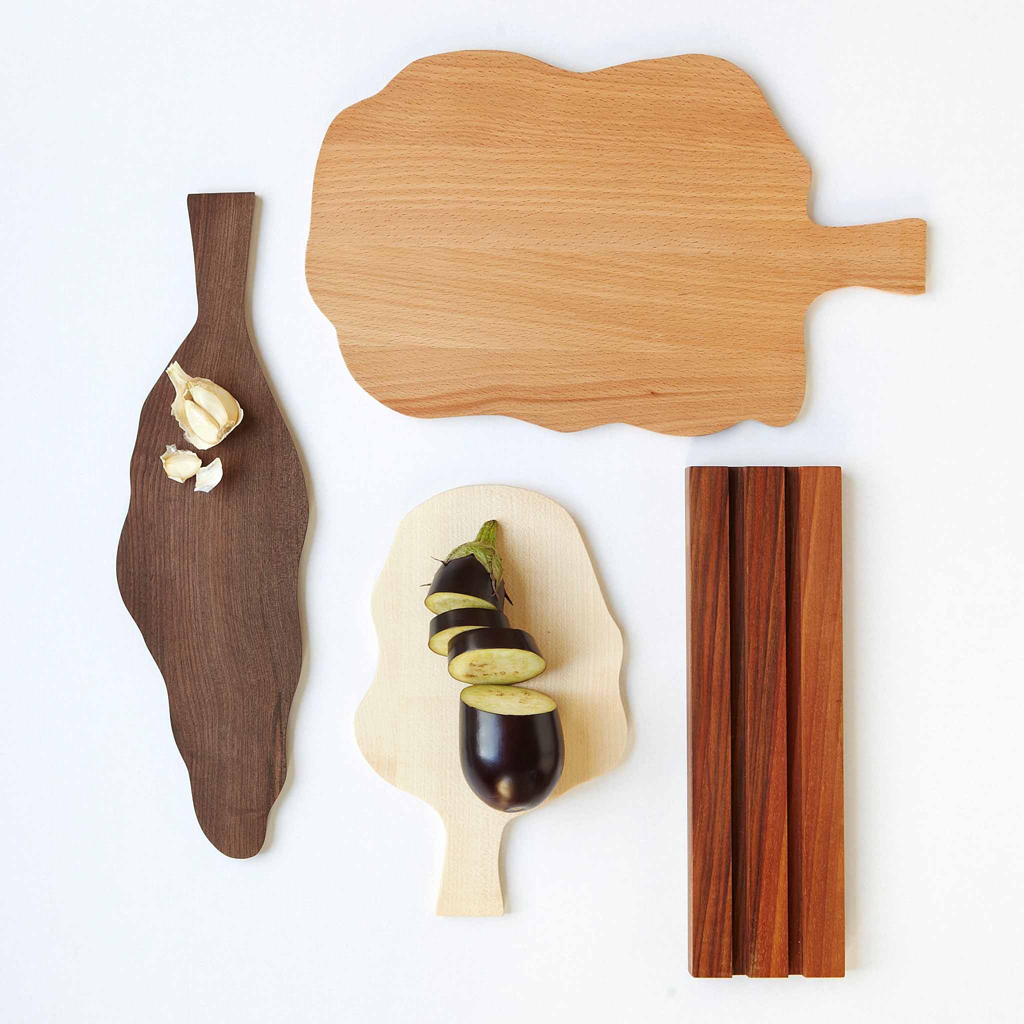 Forest Serving Board set by Fidea Design. A forest for your kitchen. Each of the three cutting board is made of a different wood - maple, beech and walnut - and comes in a different shape and size. 