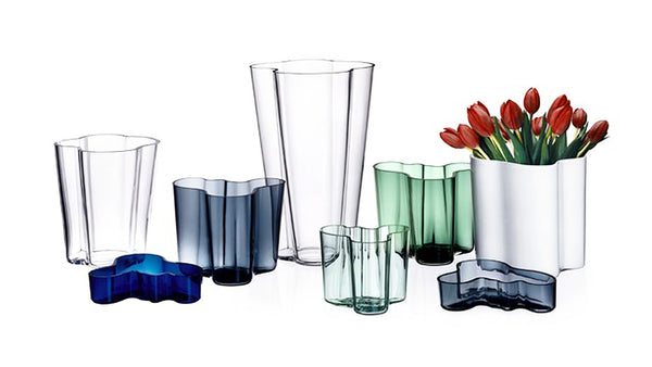 Iittala Alvar Aalto Collection (1936). The Aalto vase dates back to 1936 and was first presented at the Paris World Fair the following year. Its fluid, organic form is still mouth blown today at the Iittala factory. It takes a team of seven skilled craftsmen working as one to create one Aalto vase – an icon of modern design.