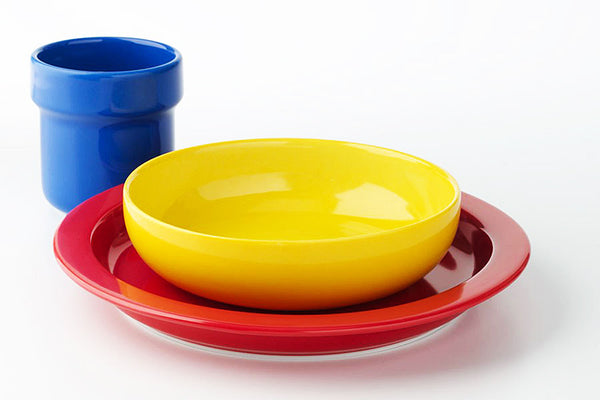David Mellor porcelain children's tableware 3-piece set. SKU 3417115. The plate has a deep rim to help the child control food. The multi-purpose bowl is nicely sized. The beaker is shaped to be easy for a child to hold.