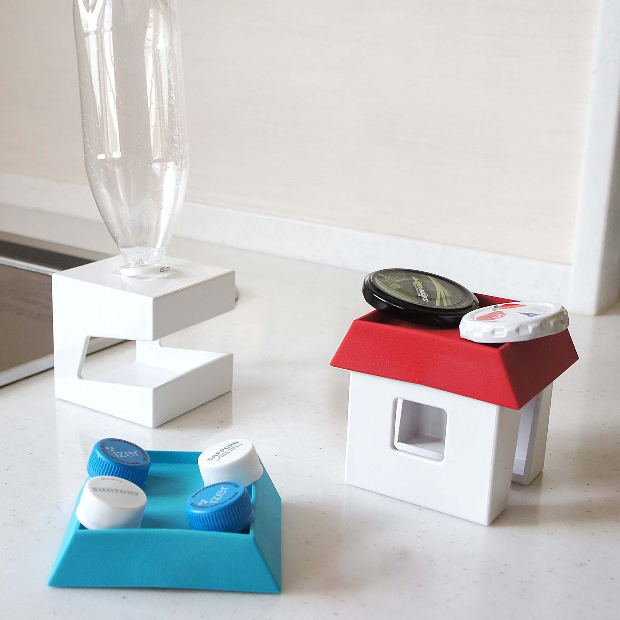Apyui Multi Stand to stand a pot lid, chopsticks and even prop up book and keep the pages open.