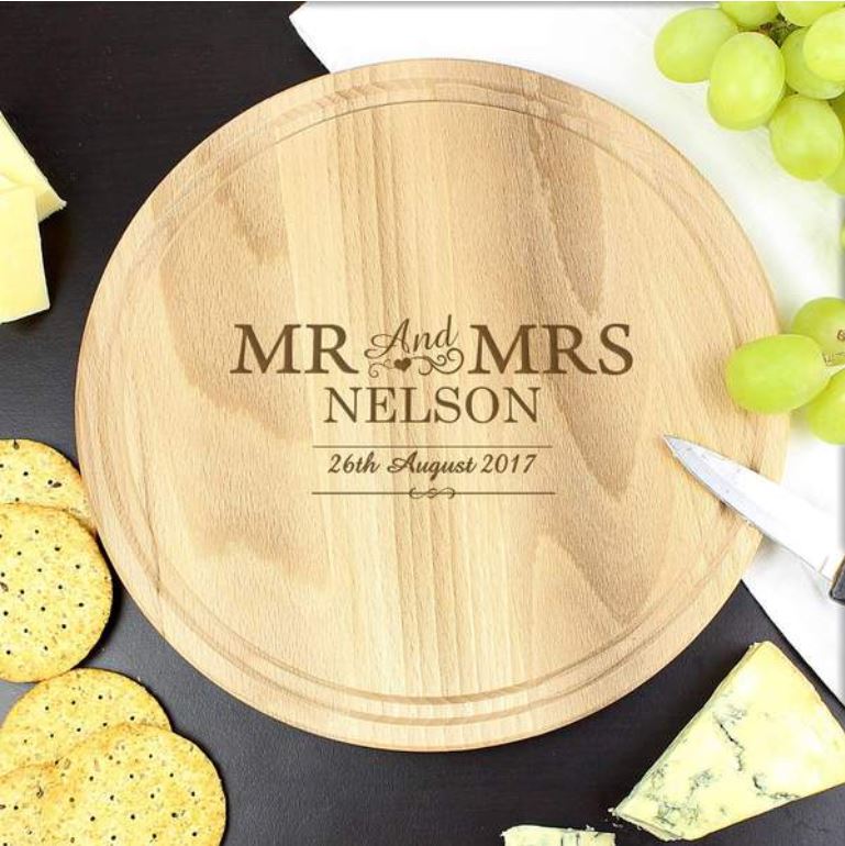 A personalised circular wooden chopping board 