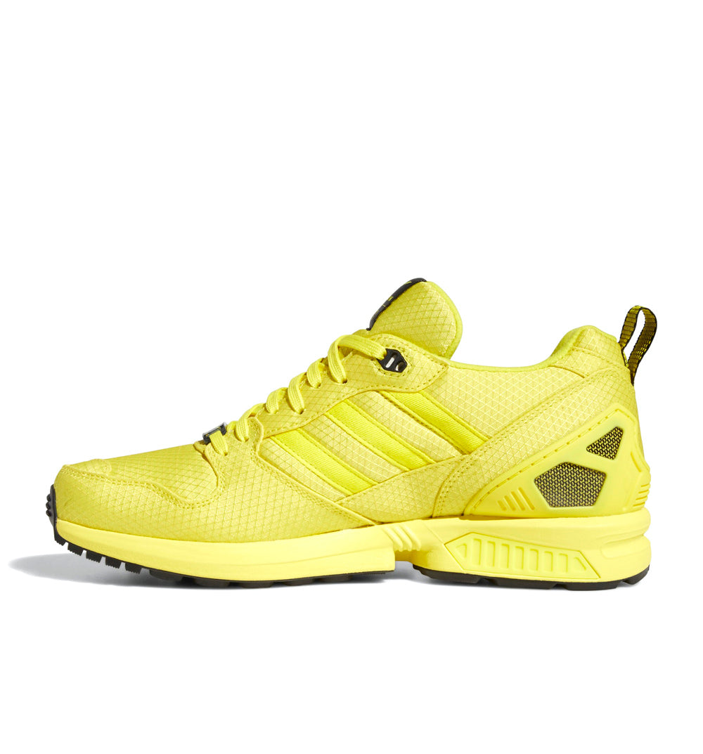 bright yellow adidas shoes